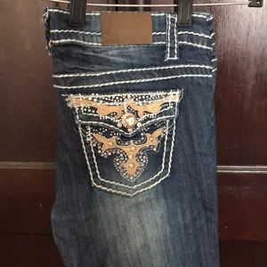 Distressed denim. Size 7/8.